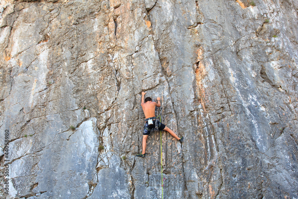 Climber on Sistiana rock, Trieste Climber on Sistiana rock, Trieste