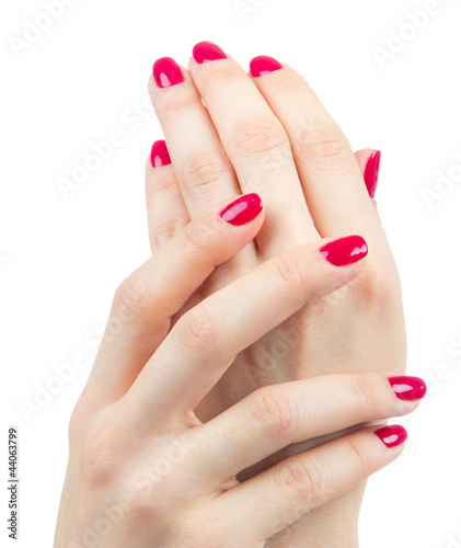 Beautiful Female Hands red manicure shellac  near face
