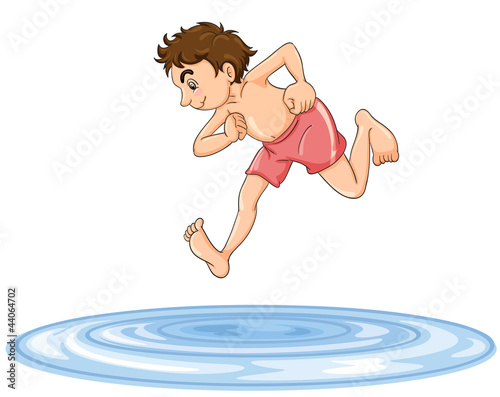 a boy diving into water