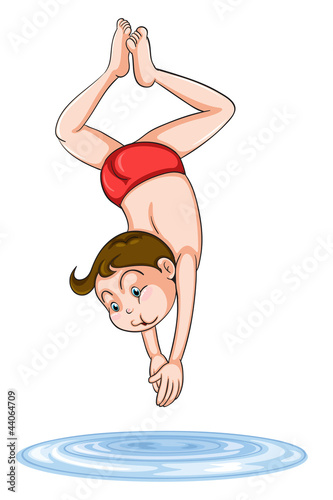 a boy diving into water
