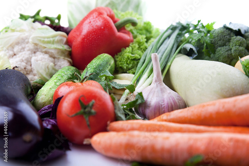 Fresh vegetables on white.