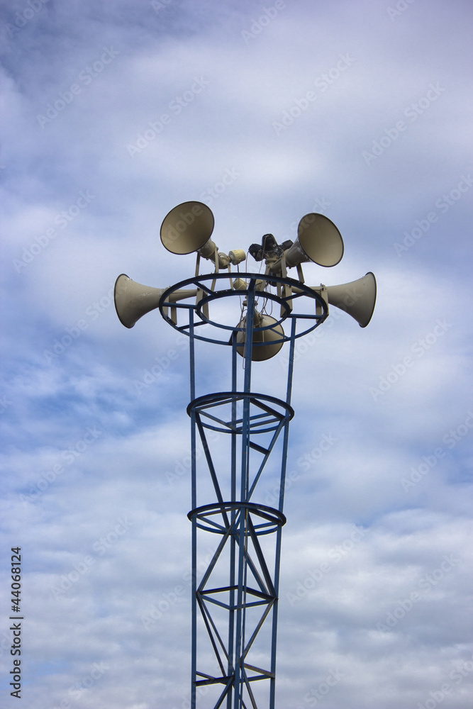many loudspeaker againt cloudy blue sky background many loudspeaker againt cloudy blue sky background