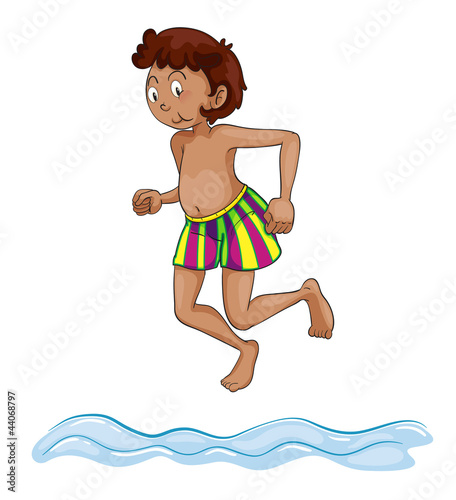 a boy diving into water