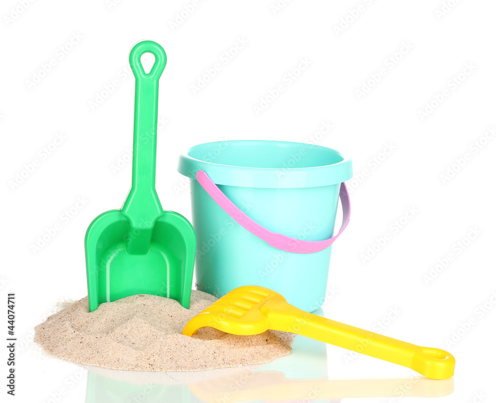 Children's beach toys and sand isolated on white Children's beach toys and sand isolated on white