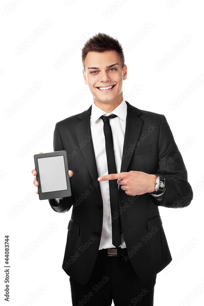 Businessman with ebook reader, pointing isolated Businessman with ebook reader, pointing isolated