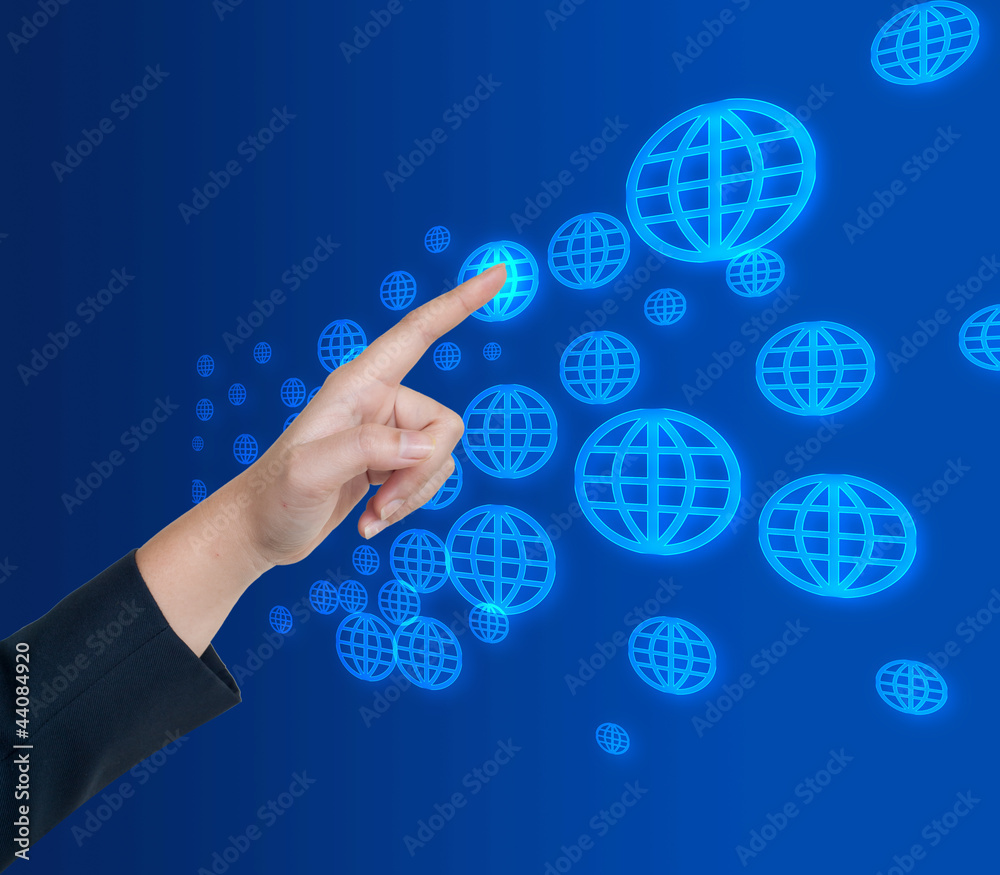 Hand pushing global button on a touch screen interface Hand pushing global button on a touch screen interface