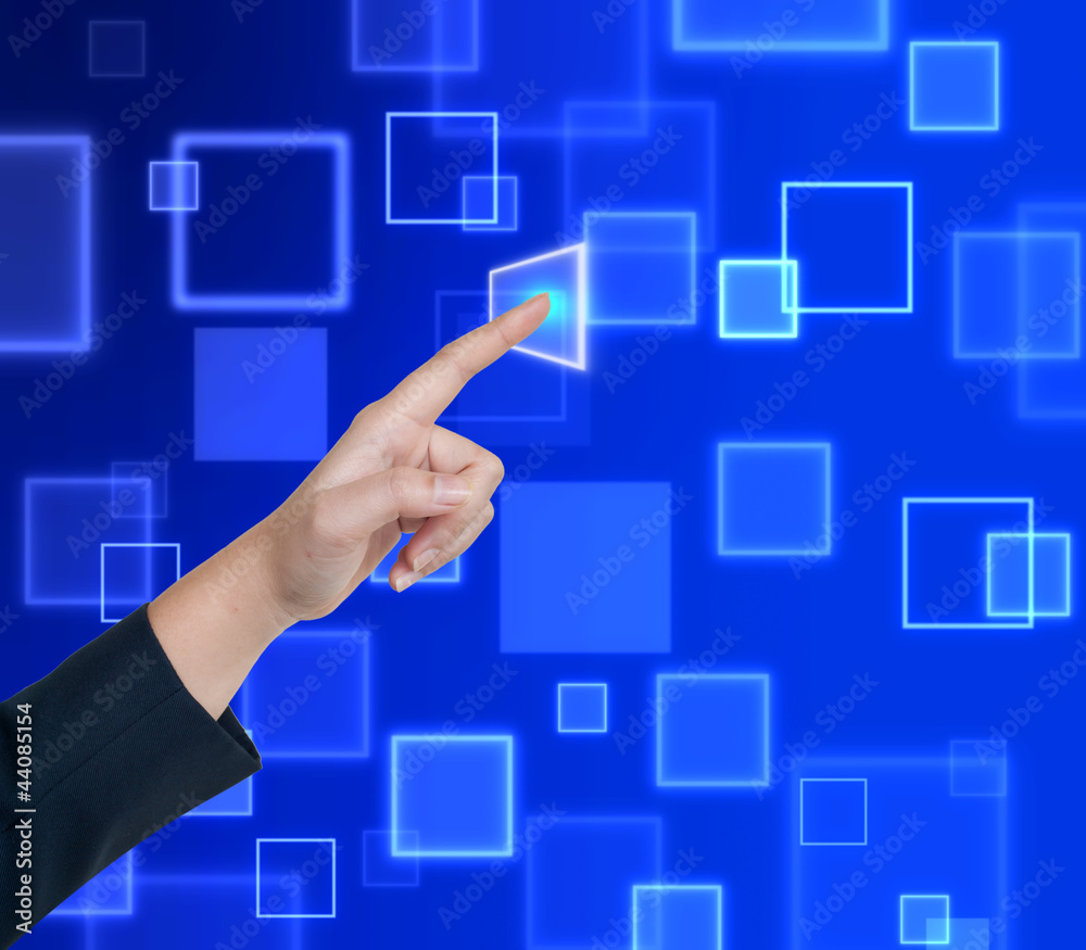 Hand pushing button on a touch screen interface Hand pushing button on a touch screen interface