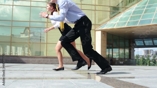 Two businesspeople making business competition