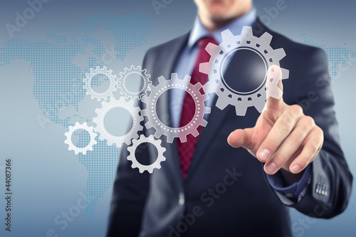 Man with Touchscreen cogwheels