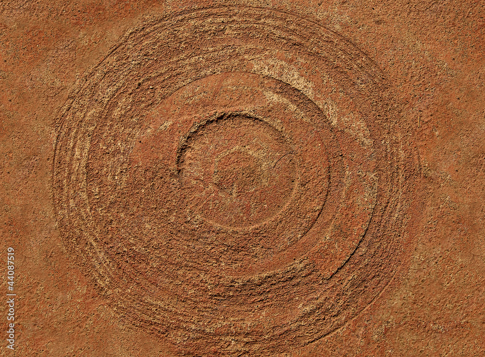 The Old trace circle on sandstone background The Old trace circle on sandstone background