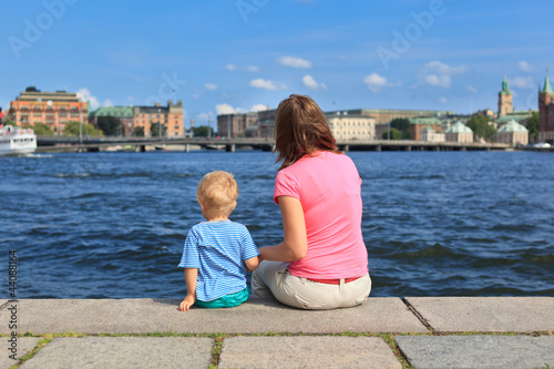 Photography Family sitting on jetty