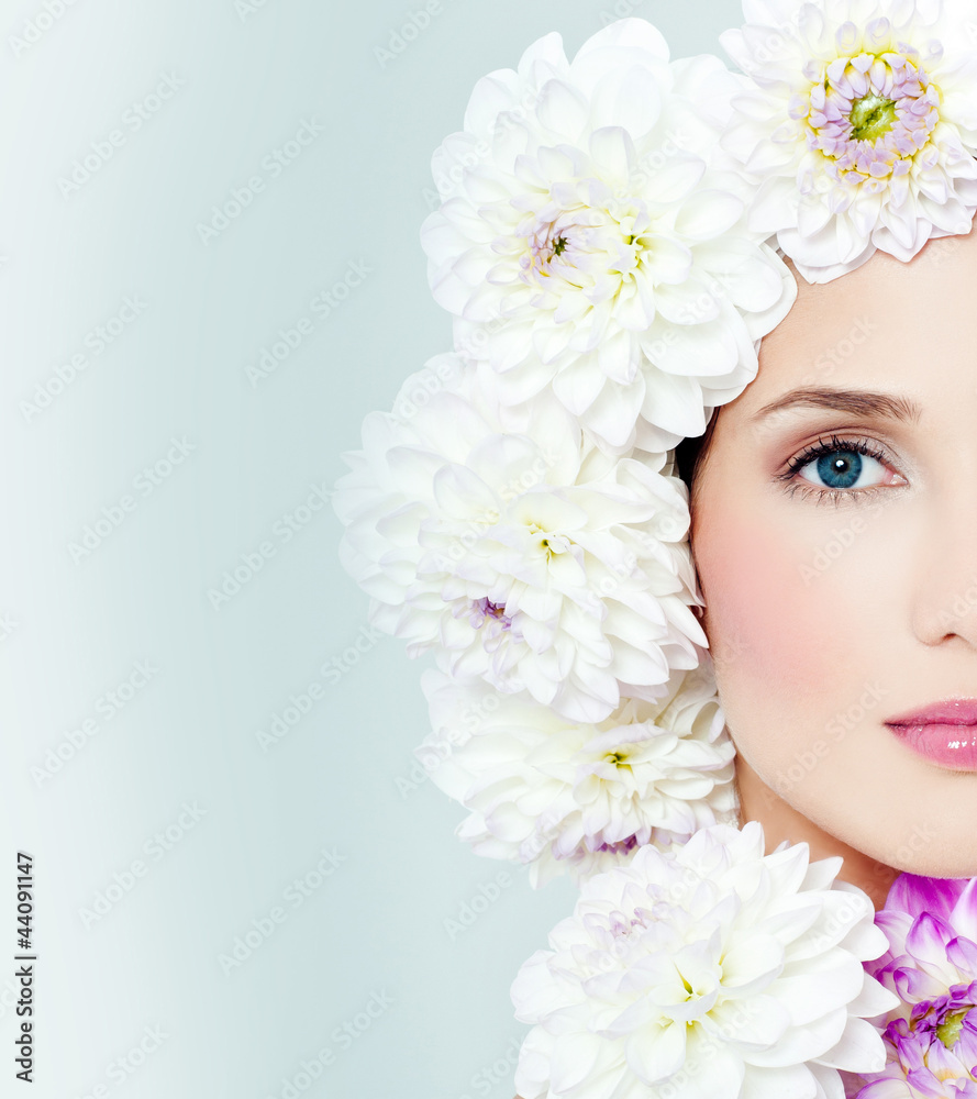 woman's face surrounded by flowers