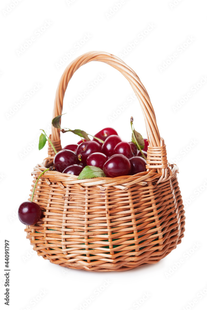 Ripe cherries in a wattled basket