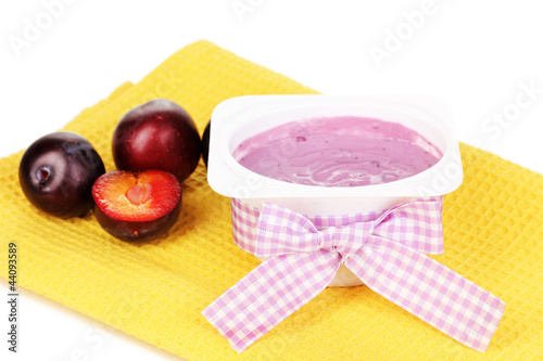 Yogurt with blueberries isolated on white photo