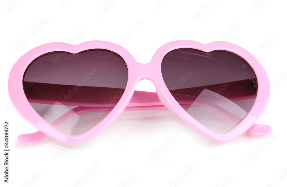 Pink heart-shaped sunglasses isolated on white Pink heart-shaped sunglasses isolated on white