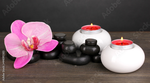 Spa stones with orchid flower and candles