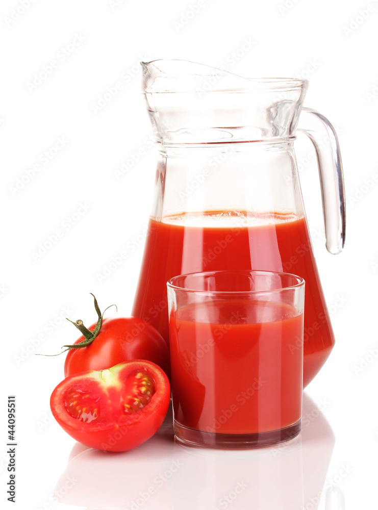 Tomato juice in pitcher and glass isolated on white Tomato juice in pitcher and glass isolated on white