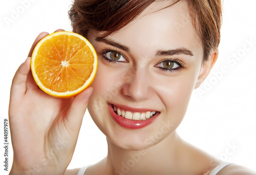 portrait of young woman with orange
