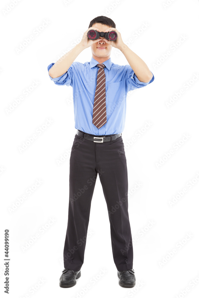 full length of businessman looks through binoculars and isolated full length of businessman looks through binoculars and isolated