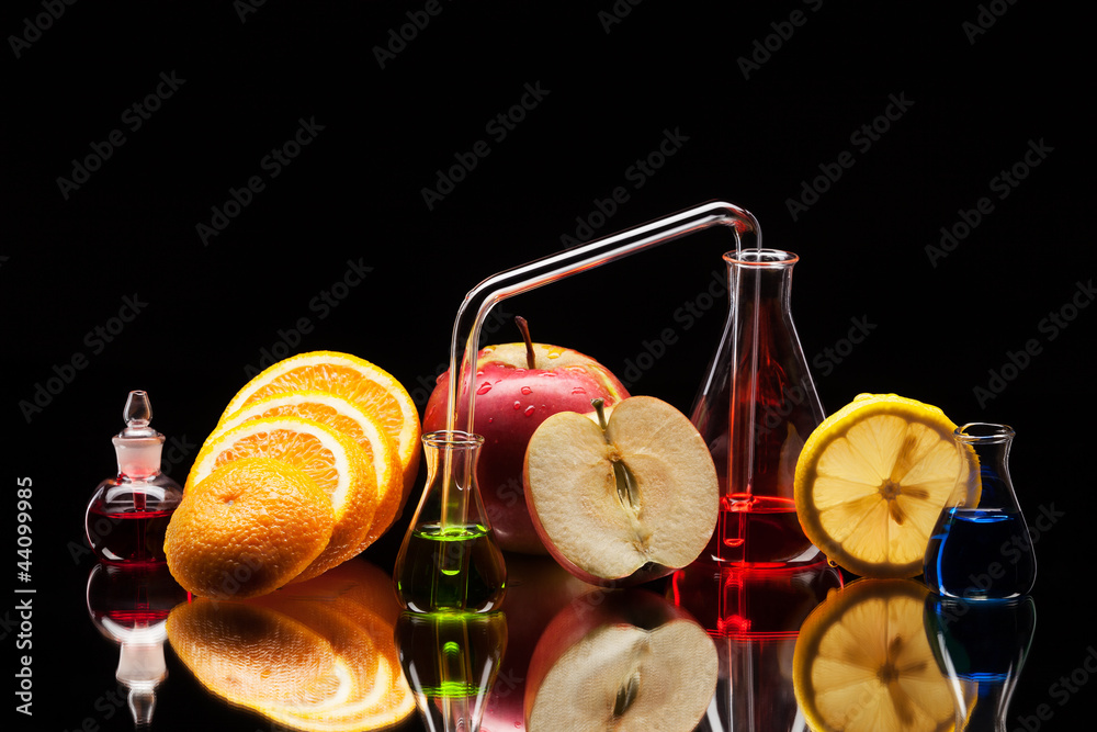 Laboratory glassware with fruits