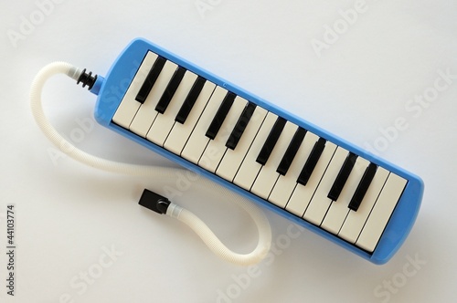 Blue Pianica with mouthpiece © Arena Photo UK