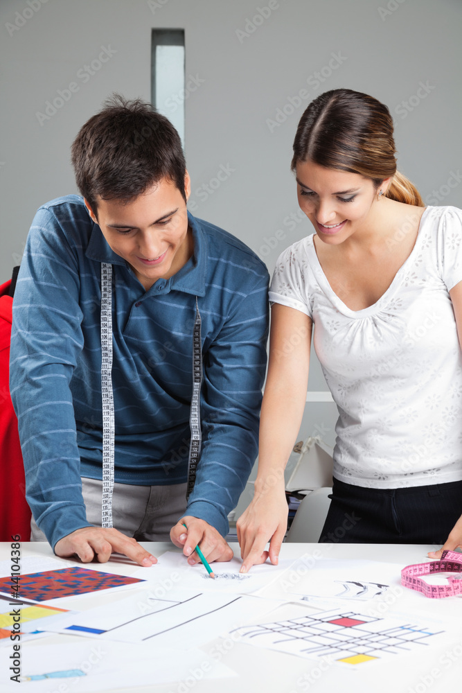 Designers Working On Rough Designs Designers Working On Rough Designs