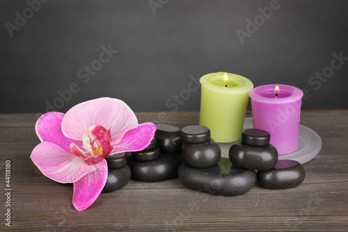 Spa stones with orchid flower and candles