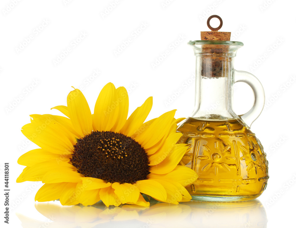 oil in jar and sunflower, isolated on white oil in jar and sunflower, isolated on white