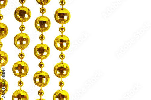 Background made of a brilliant celebratory beads of golden color