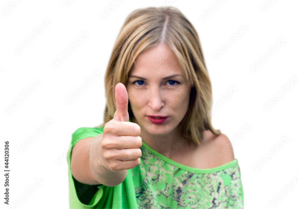 Beautiful woman giving thumbs up for approval
