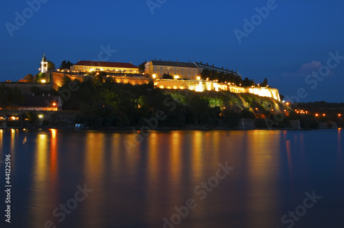 Petrovaradin fortress on river Danube, by night