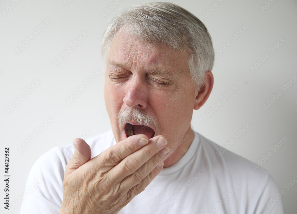senior man getting ready to yawn or sneeze senior man getting ready to yawn or sneeze