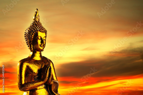 Golden Buddha meditating