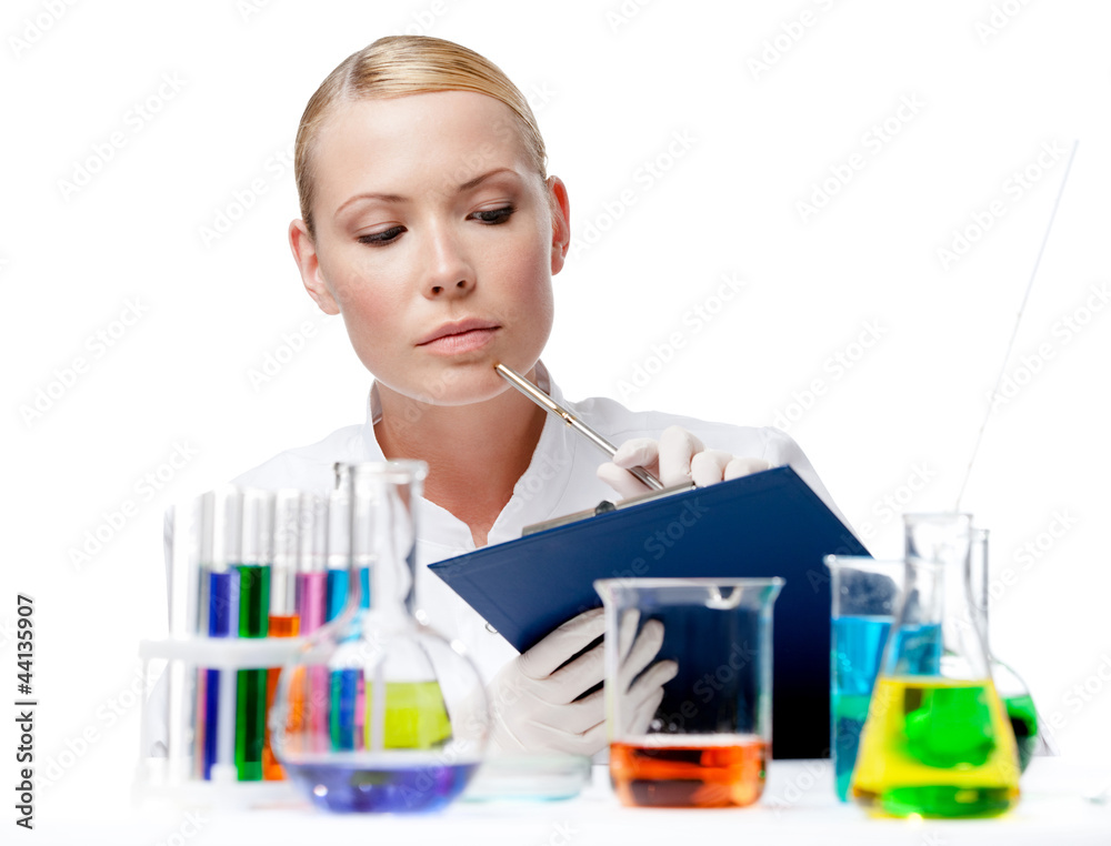 Doctor notes something after the experiment, isolated on white Doctor notes something after the experiment, isolated on white