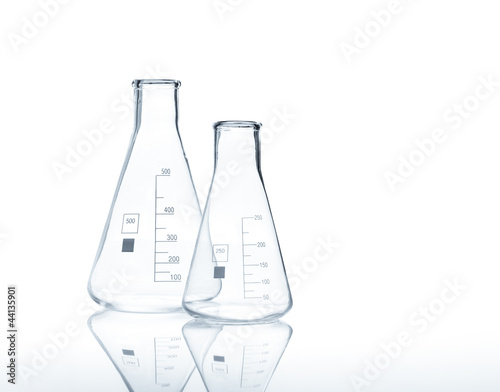 Two empty conical Erlenmeyer flasks, isolated photo