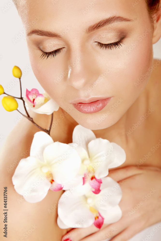 A pretty young woman with a flower A pretty young woman with a flower