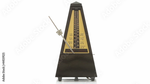 Music lesson: metronome playing at 120 bpm. With sound. photo