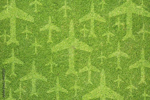 Airplane icon on green grass texture and  background