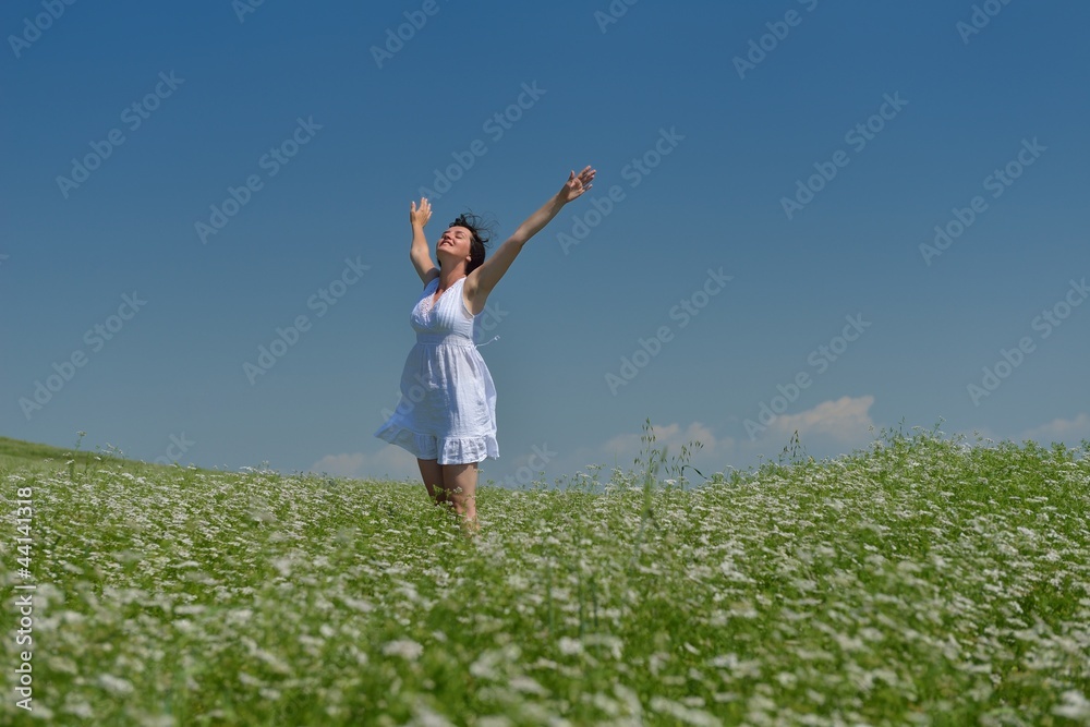 Young happy woman in green field Young happy woman in green field