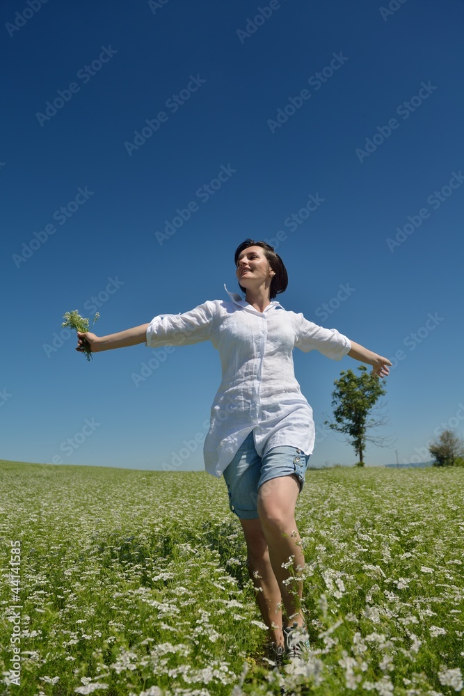 Young happy woman in green field Young happy woman in green field