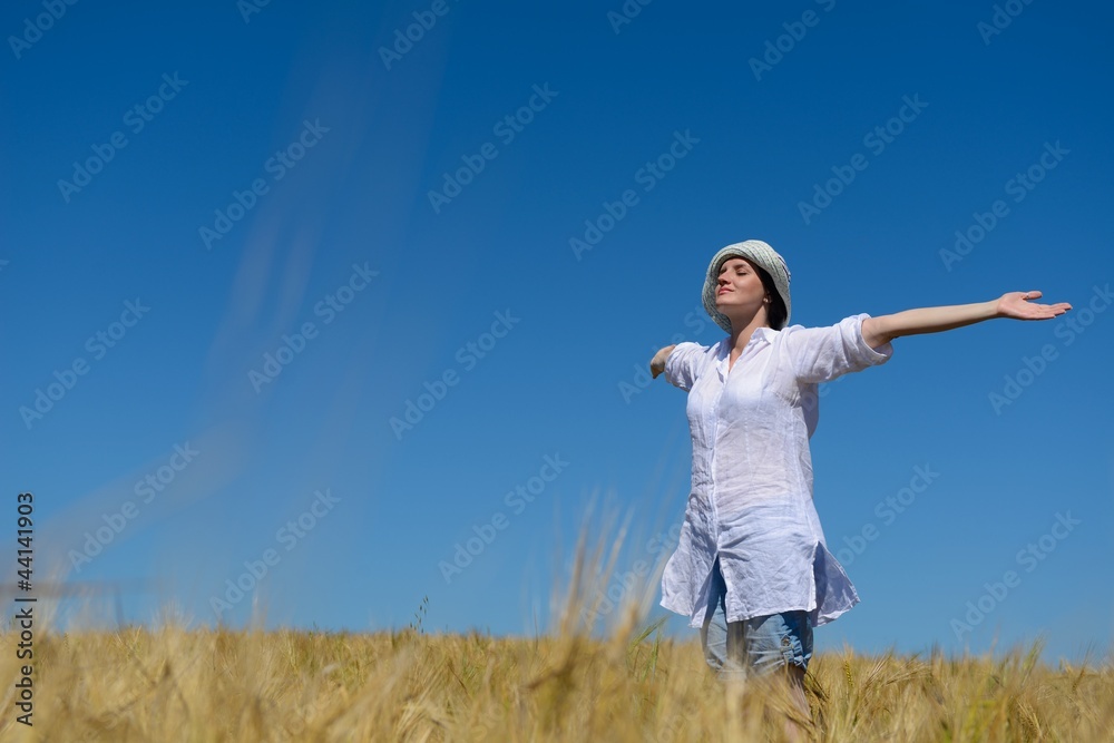 young woman in wheat field at summer young woman in wheat field at summer