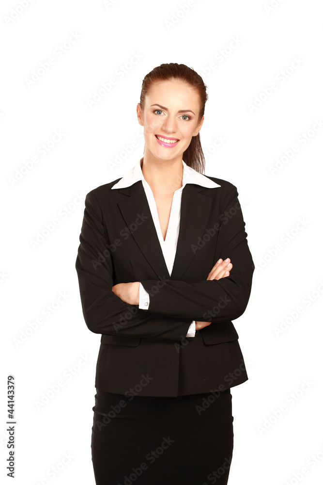 A beautiful woman standing with her arms crossed A beautiful woman standing with her arms crossed