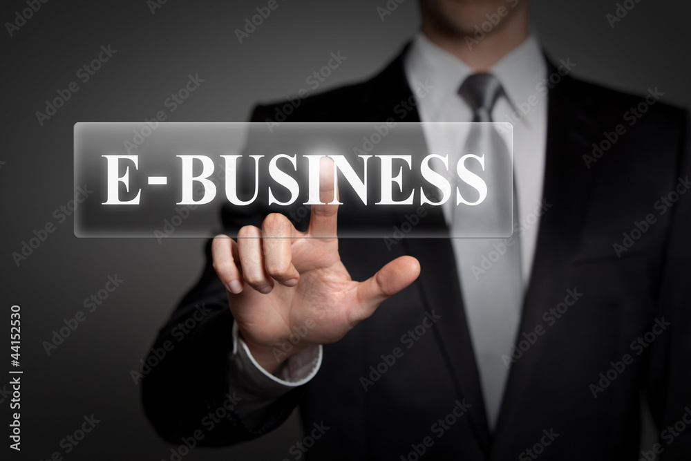 businessman pressing virtual button - E-business businessman pressing virtual button - E-business
