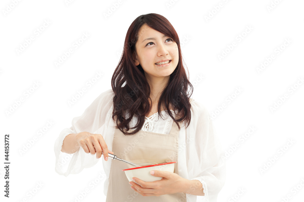 Beautiful young woman cooking. Portrait of asian. Beautiful young woman cooking. Portrait of asian.