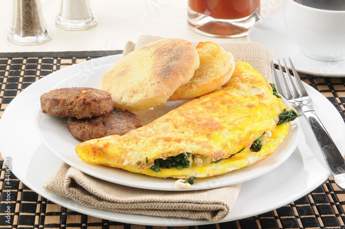 Spinach omelet with sausage photo