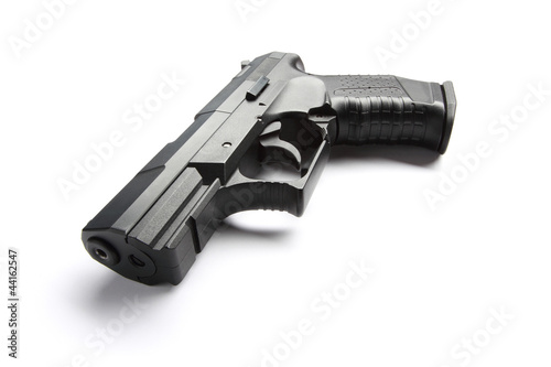 Black handgun on white