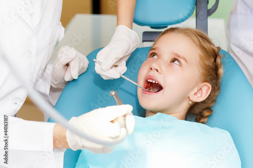 Little girl visiting dentist #44163187