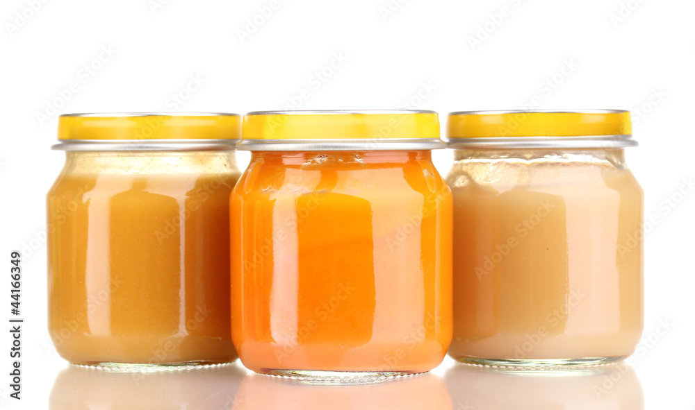 Jars of baby puree isolated on white Jars of baby puree isolated on white