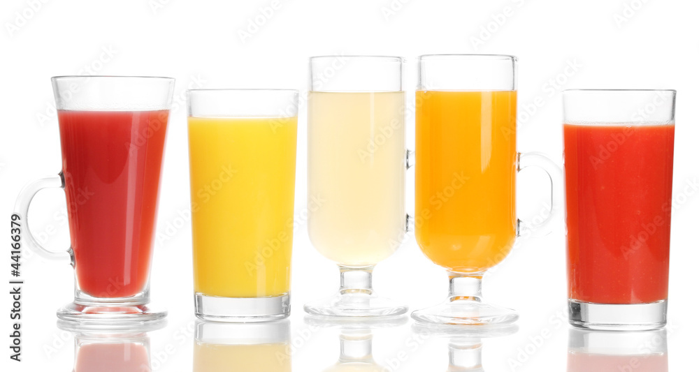 Tropical juices in glasses isolated on white Tropical juices in glasses isolated on white