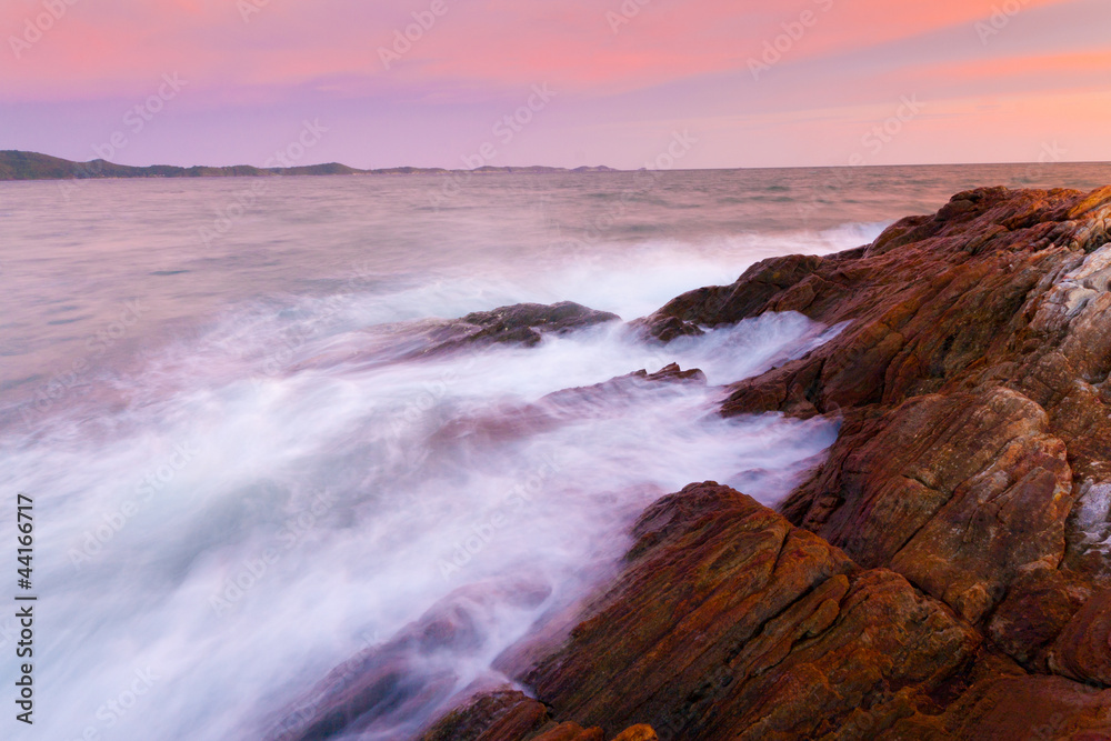 The beautiful rock bay in sunset colour